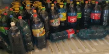 Frustran contrabando de 300 litros de nafta en botellas de gaseosas