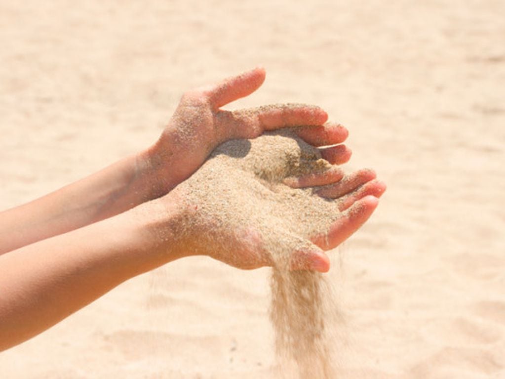truco para quitarte la arena de la playa