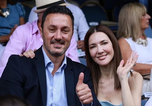 Cristina Pérez y Luis Petri, en el carrusel.