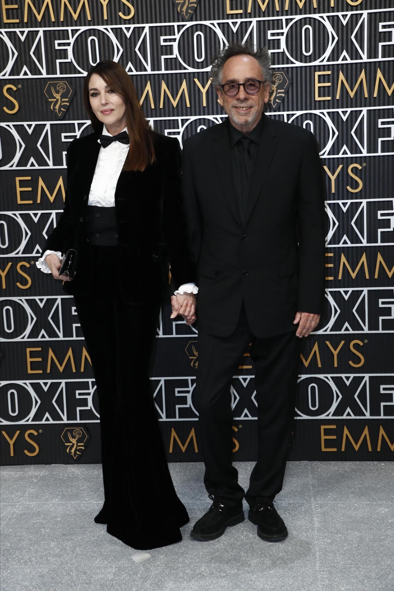 Los Angeles (United States), 13/01/2024.- (L-R) Monica Bellucci and Tim Burton arrive for the 75th annual Primetime Emmy Awards ceremony held at the Peacock Theater in Los Angeles, California, USA, 15 January 2024. The Primetime Emmys celebrate excellence in national primetime television programming. EFE/EPA/CAROLINE BREHMAN
