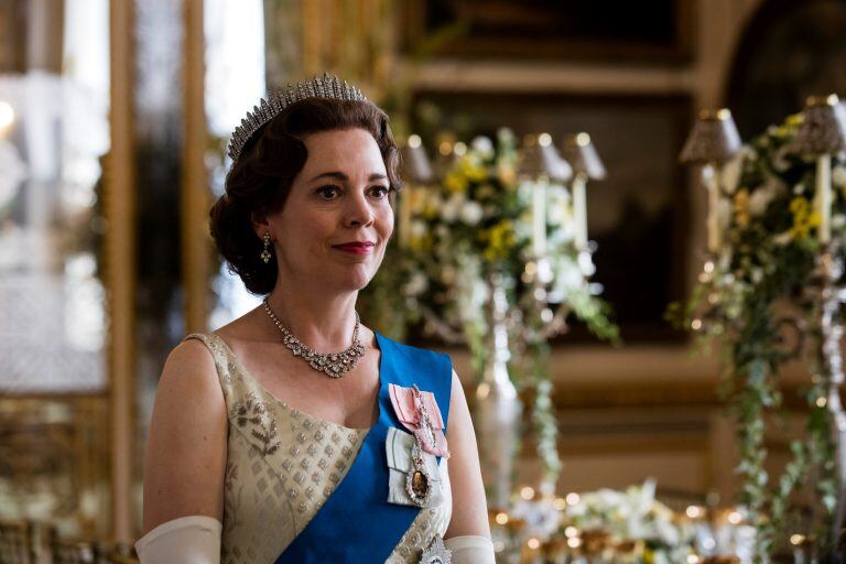 In this image released by Netflix, Olivia Colman portrays Queen Elizabeth II in a scene from \