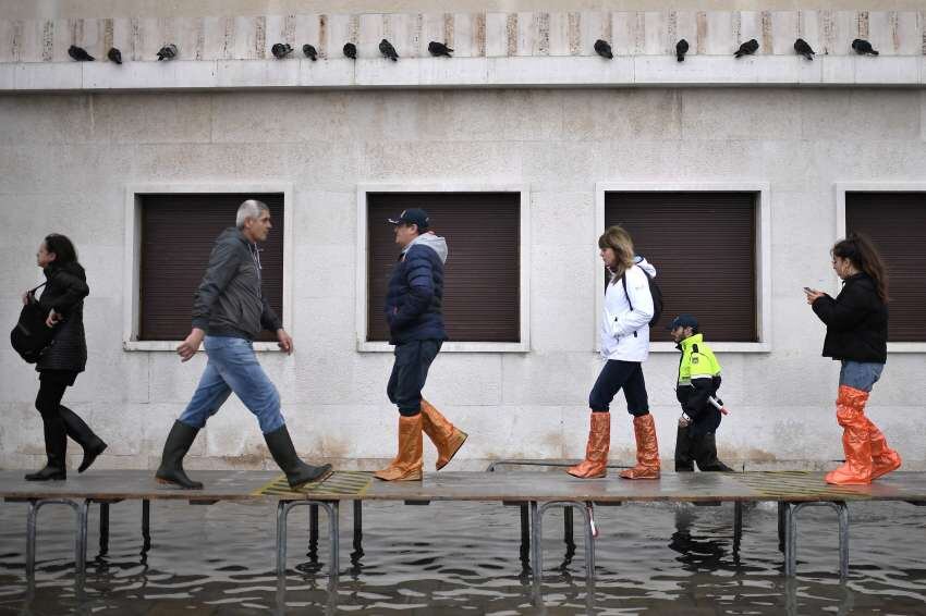 
La Protección civil comunicó que 130 bomberos están interviniendo en estas horas en Venecia | AFP
   