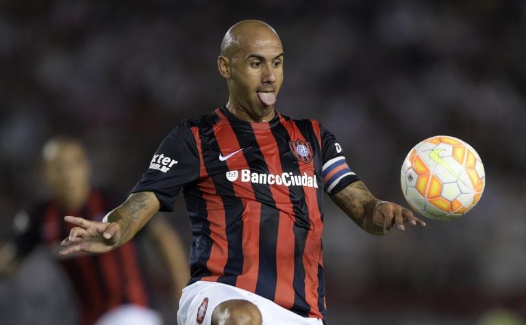 San Lorenzo's  midfielder Juan Mercier gestures during their Recopa Sudamericana 2015 first final football match against River Plate at the Monumental stadium in Buenos Aires, Argentina, on February 6, 2015. AFP PHOTO / Juan Mabromata buenos aires Juan Mercier futbol recopa sudamericana 2015 futbol futbolistas partido river plate vs san lorenzo