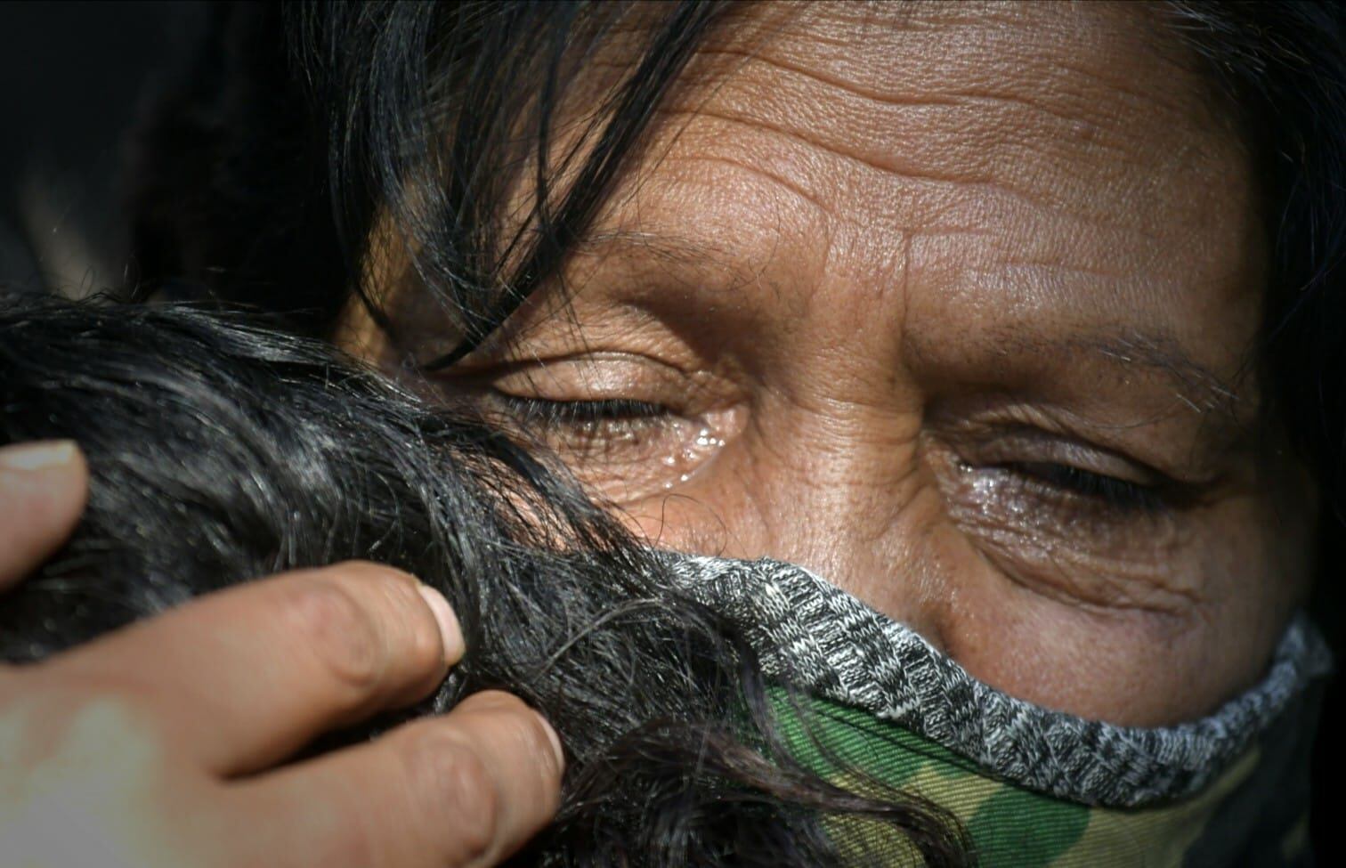 Ramona, mamá de Gisella Gutiérrez -desaparecida en el barrio La Favorita en 2015- también participó de la marcha. Foto: Orlando Pelichotti / Los Andes.