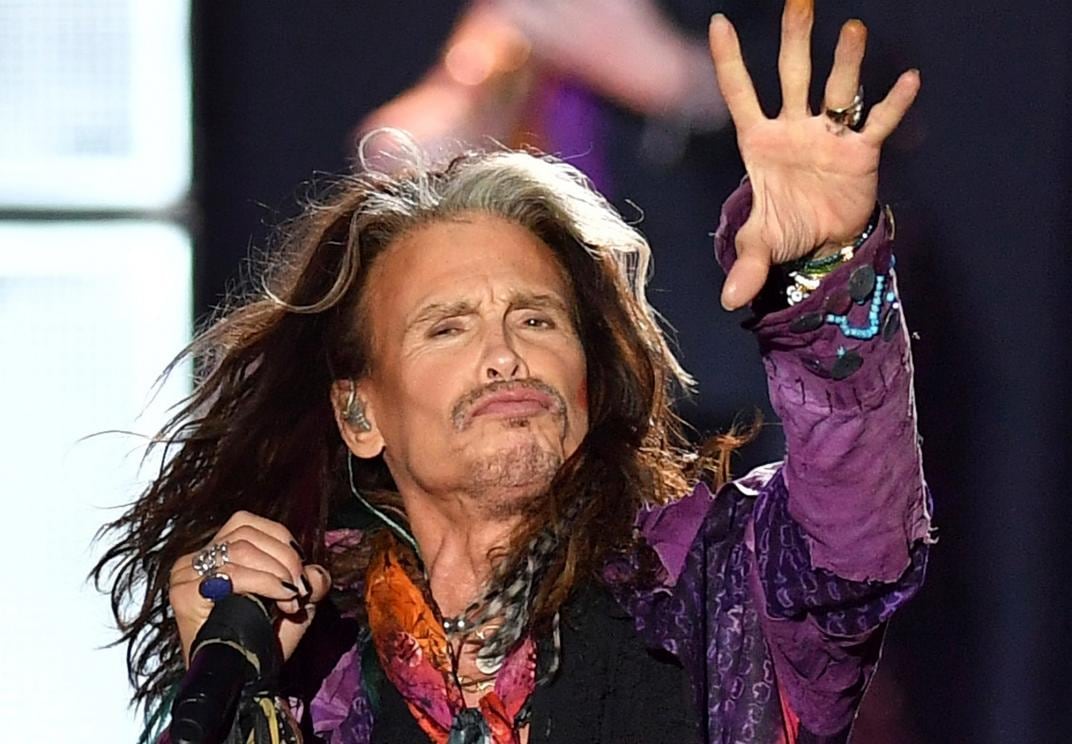 FILE - In this May 26, 2017, file photo, singer Steven Tyler performs during an Aerosmith concert at the Koenigsplatz in Munich, Germany. In a statement posted to the band's website on Oct. 2, 2017, Tyler disputed rumors about his health surrounding an ea