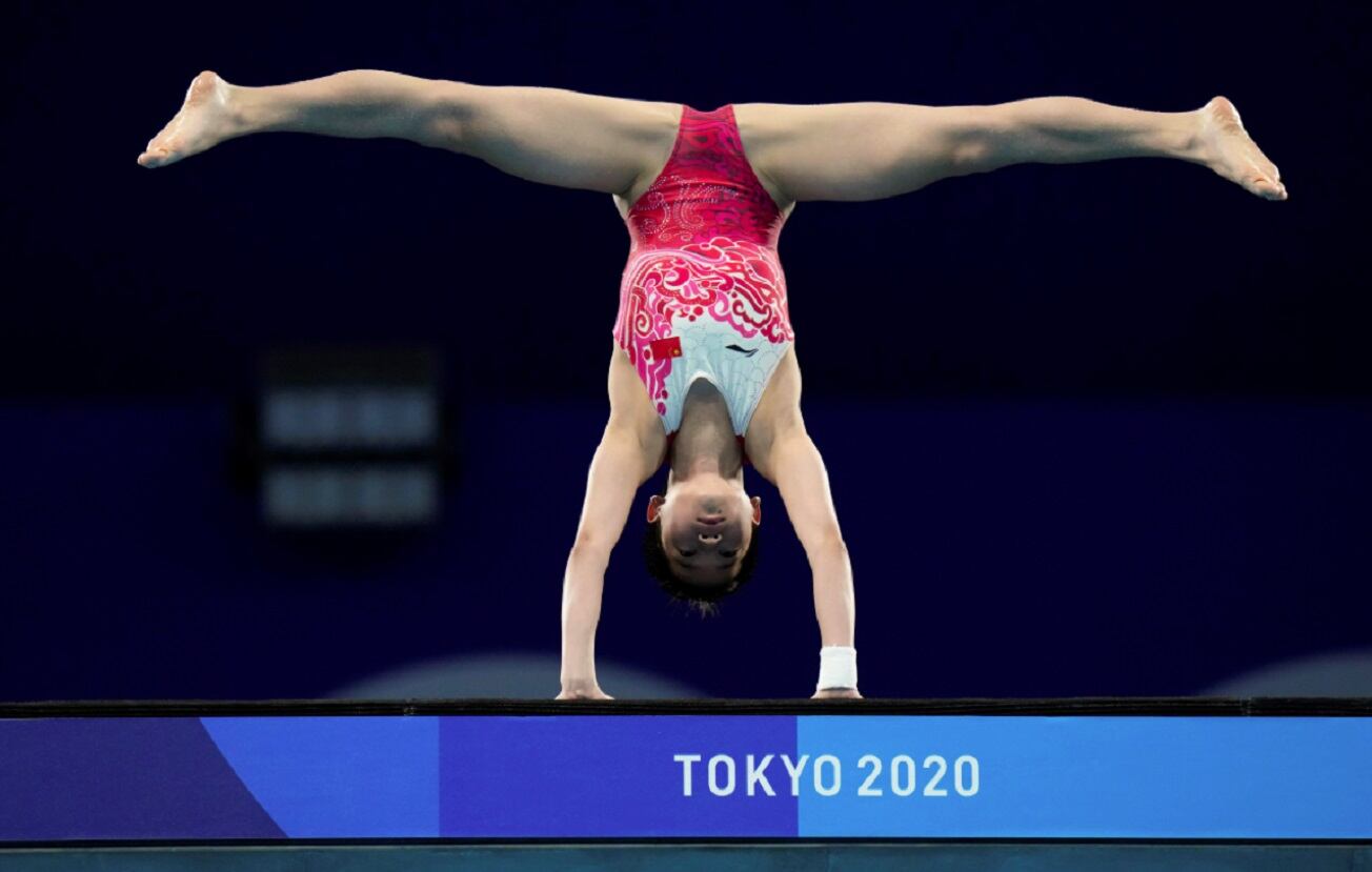 Quan Hongchan tiene 14 años, competía para mantener a su mamá enferma y ganó el oro - 