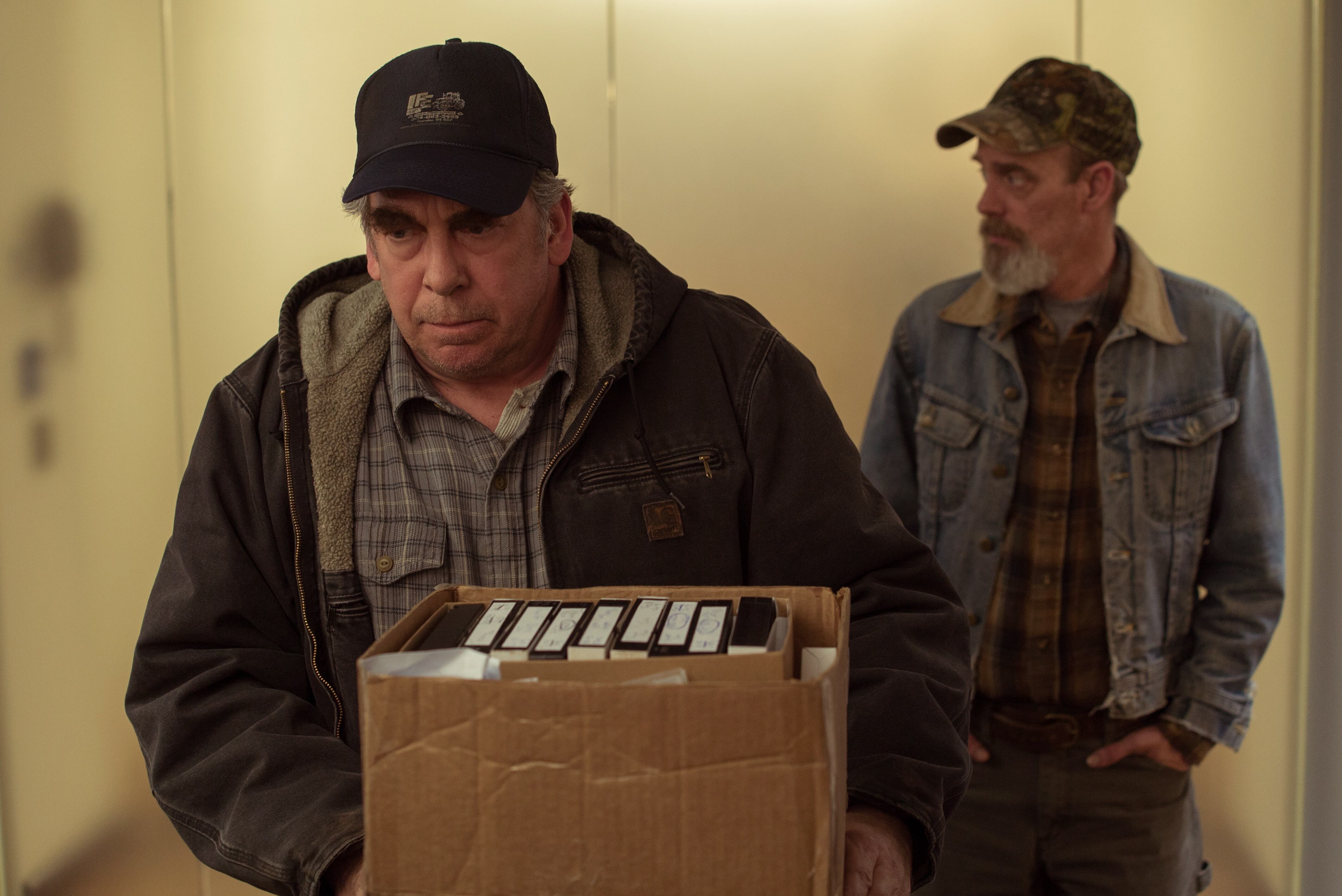 Bill Camp (left) as "Wilbur Tennant" and Jim Azelvandre (right) as "Jim Tennant" in director Todd Haynes' DARK WATERS, a Focus Features release. Credit : Mary Cybulski / Focus Features