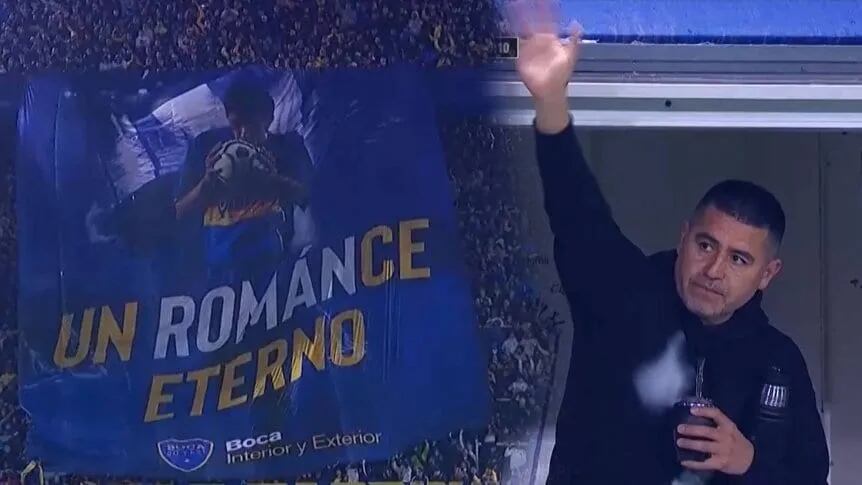 Juan Román Riquelme y la bandera con su frase de campaña