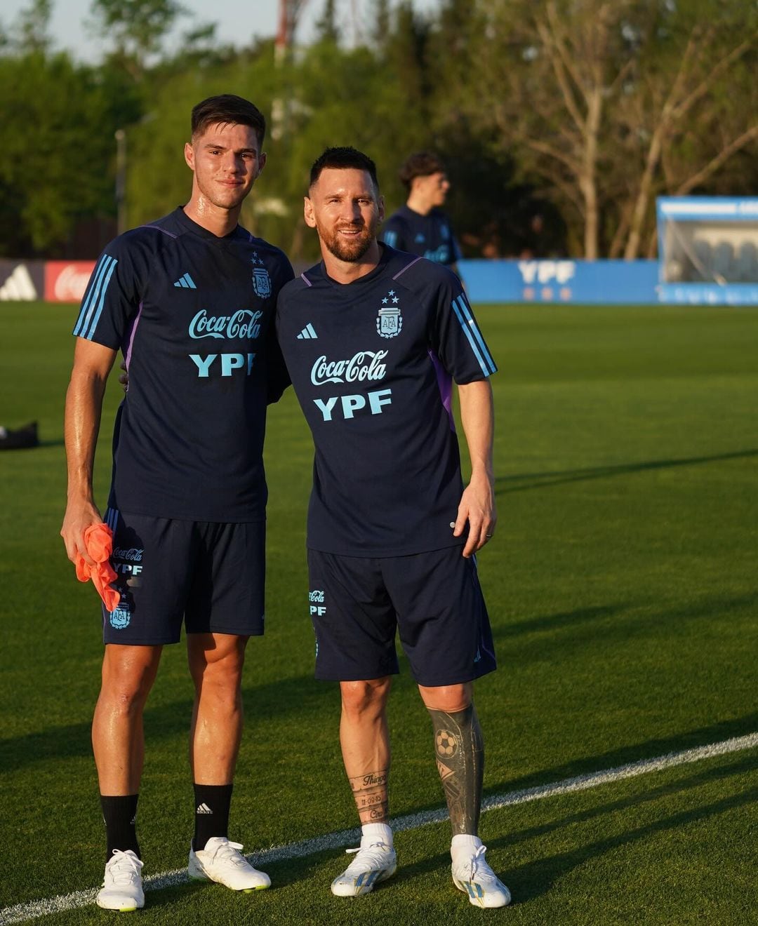 Marco Pellegrino y Lionel Messi