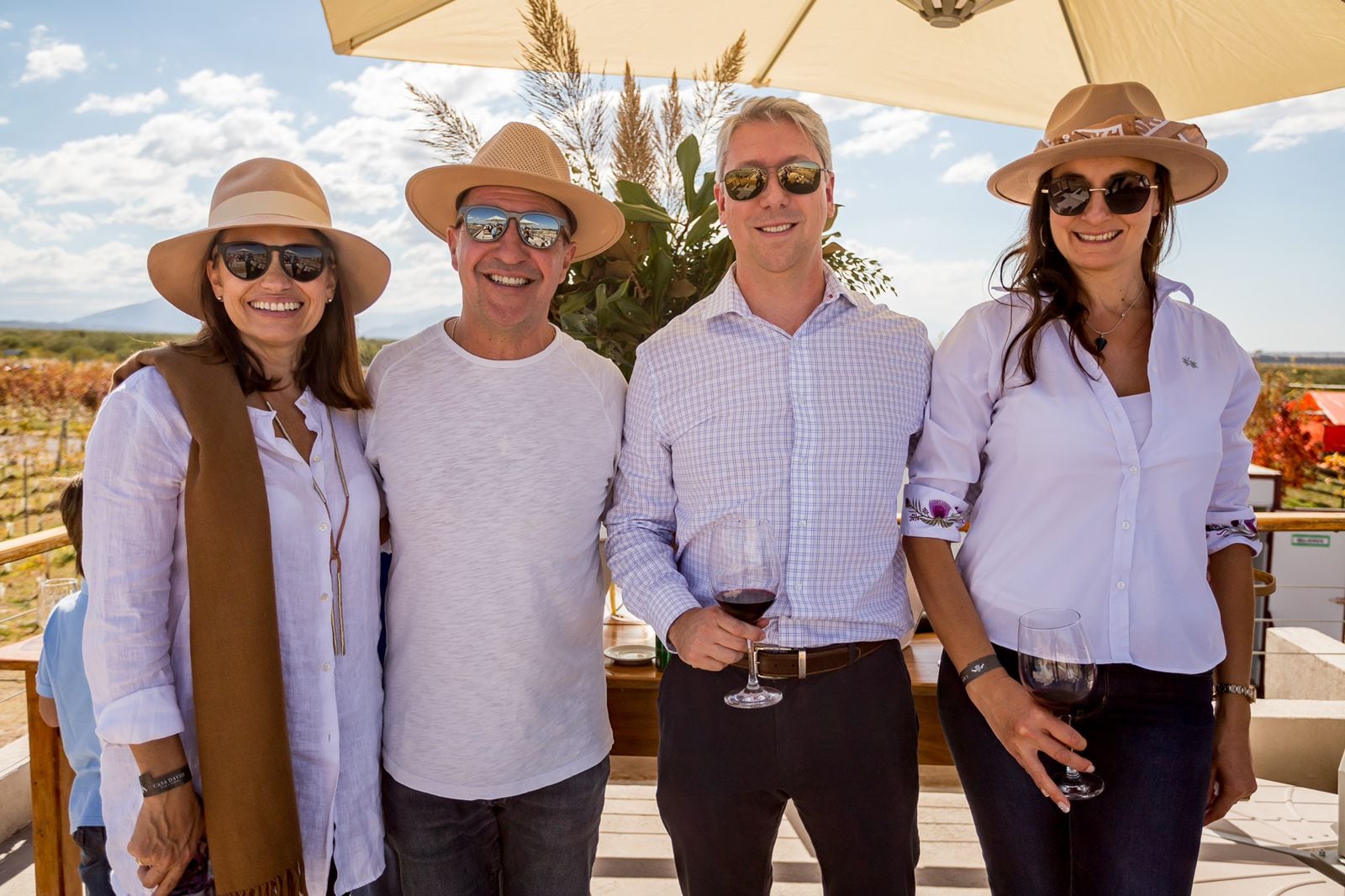 Fabián Andreu y Adrián Rizzo compartiendo junto a sus esposas